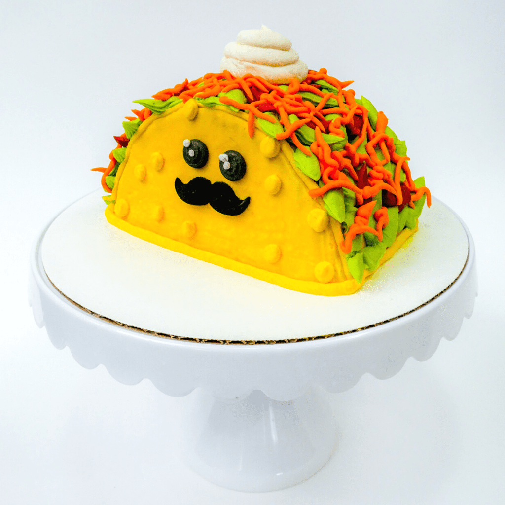 The taco cake decorating kit comes with your choice of cake along with homemade buttercream and instructions to create edible art perfect for your next fiesta