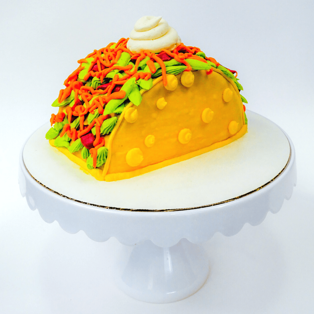 The back of the taco cake decorating kit, which comes with your choice of cake along with homemade buttercream and instructions to create edible art perfect for your next fiesta